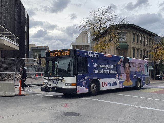 A Madison Metro bus driving from State Street to the Capitol Square.