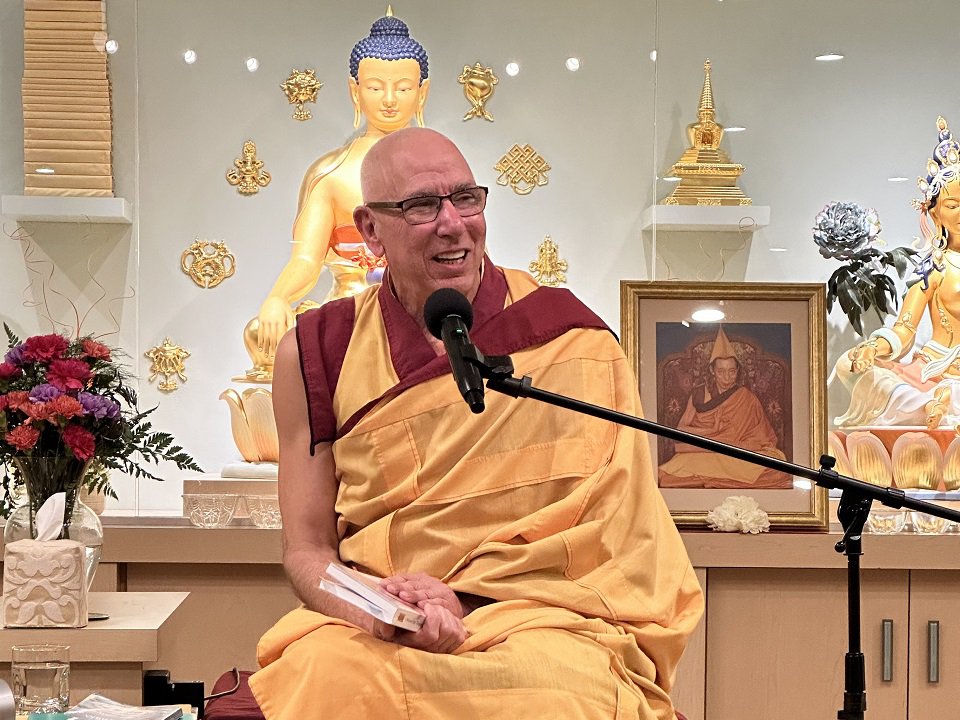 Gen Kelsang Dorje at the mic.