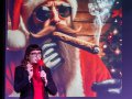 Sasha Rosser with a mic in front of a cigar-smoking Santa.