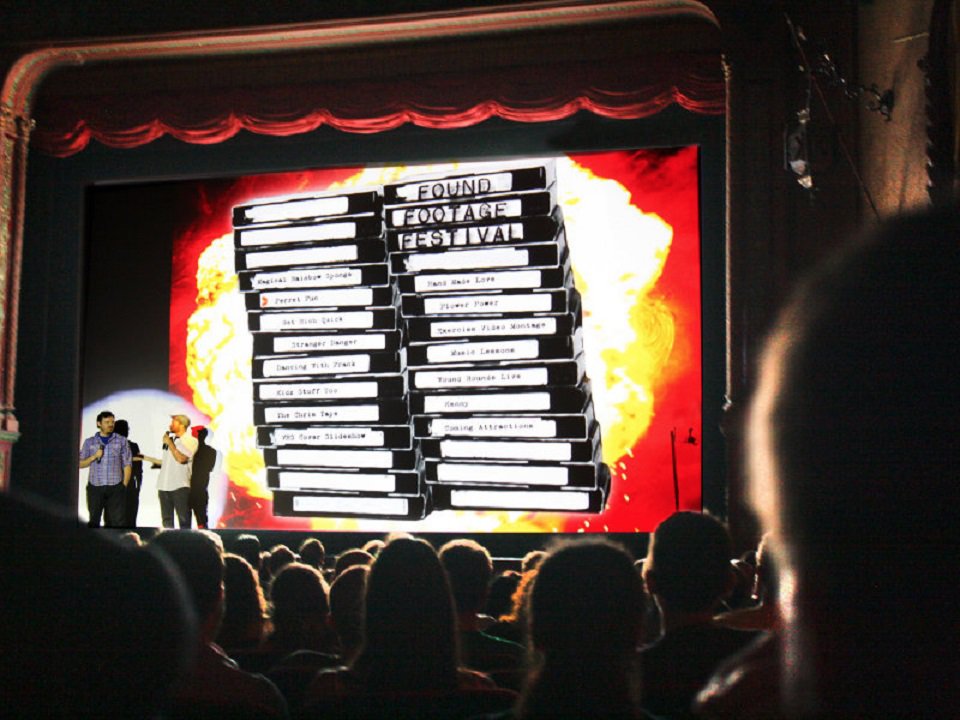 Joe Pickett (left) and Nick Prueher on stage at the Found Footage Festival.