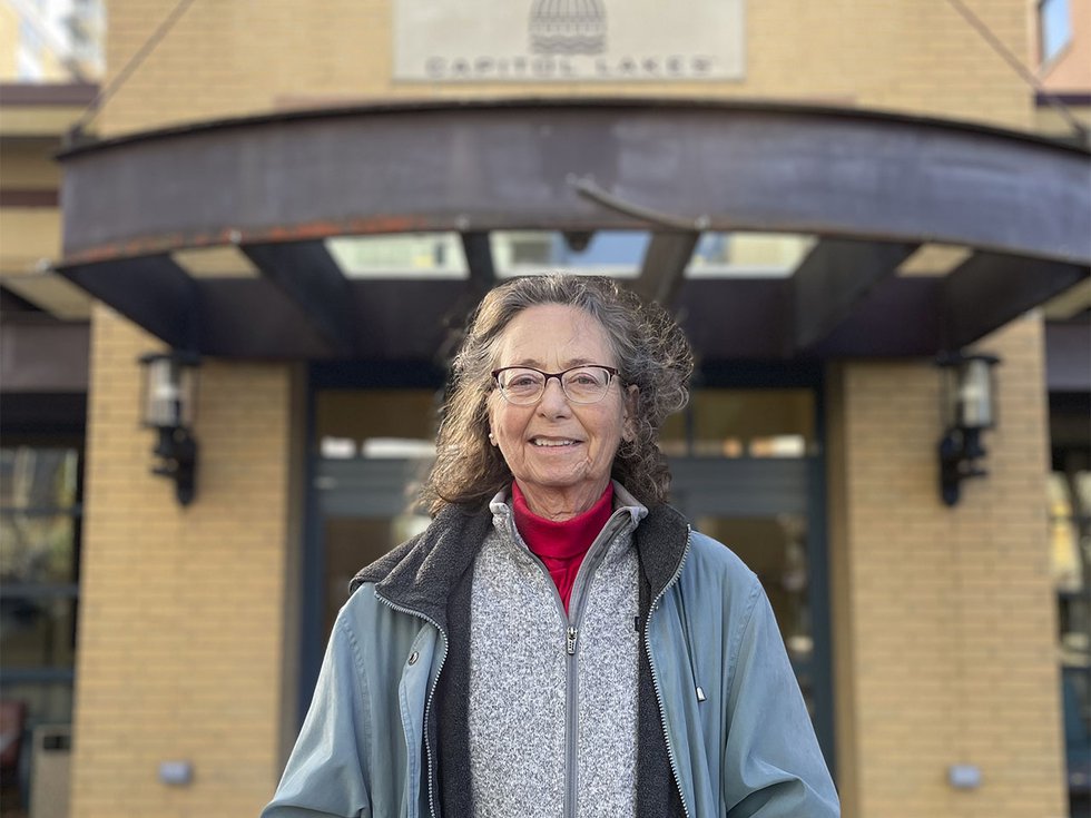 Volunteer Ivy Corfus outside Capitol Lakes Retirement Community.