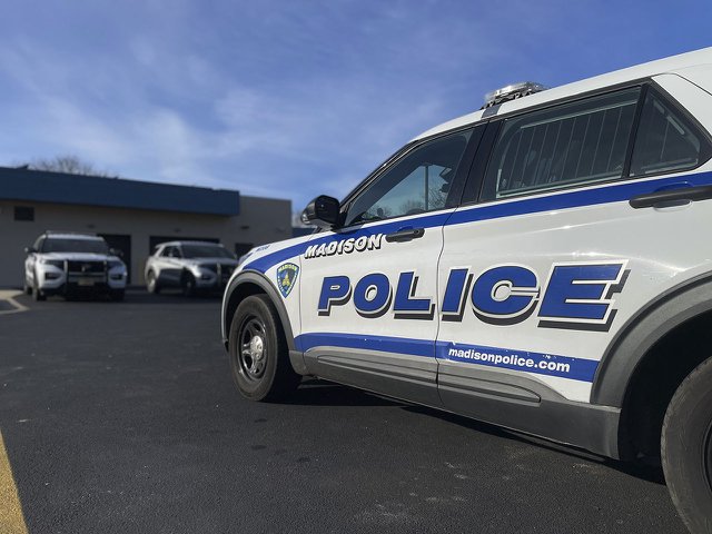 Cop cars parked at the Midtown police department on Mineral Poin