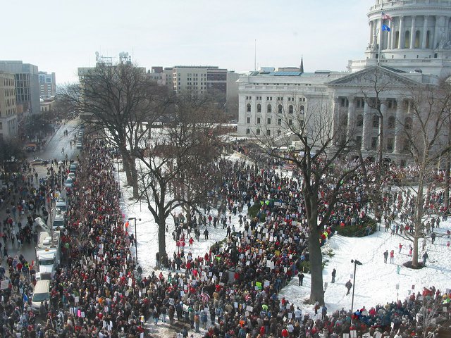 A protest over Act 10 in front of the Capitol building in February 2011